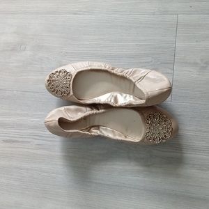 Tahari tan flats with gold buckle on front  size 10